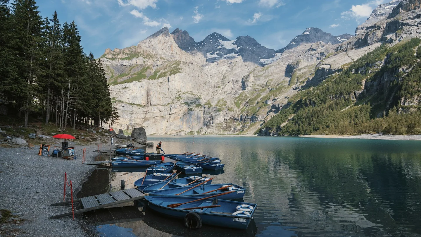 Wooden boats at the shore of Oeschinen Lake